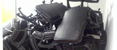A pile of old office chairs.